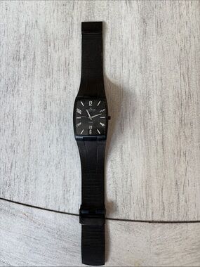 Skagen men’s watch square/rectangle face. Needs battery.